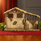 Lighted Nativity Stable – 10-Inch Scale, shown in a lifestyle setting