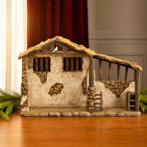 Lighted Nativity Stable – 7-Inch Scale, shown in a lifestyle setting