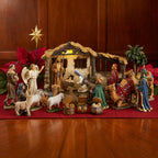 Complete Lighted Nativity with Extra Animals & Palm Tree, 23-Piece Set – 7-Inch Scale, shown in a lifestyle setting